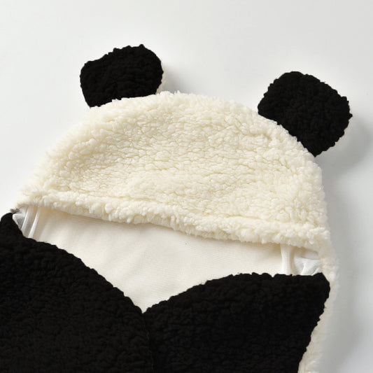 Soft black and white fleece baby swaddle blanket with panda ears.