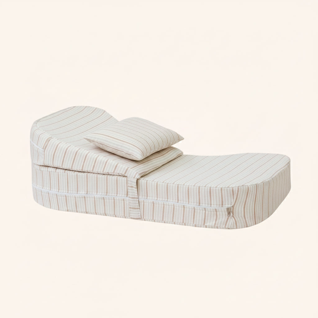 Adjustable anti-reflux baby feeding pillow with striped cover, showing removable ramp and dimensions.
