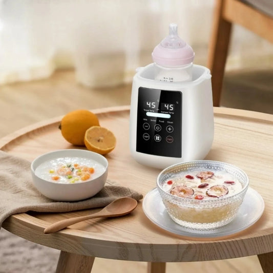 White digital 6-in-1 bottle warmer and sterilizer with LCD screen, heating a pink baby bottle.