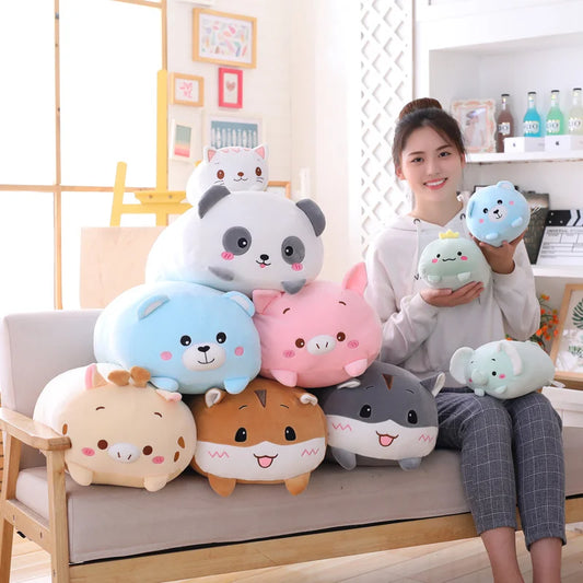 Soft plush animal toys in various colors and sizes, including a panda, pig, bear, and elephant.