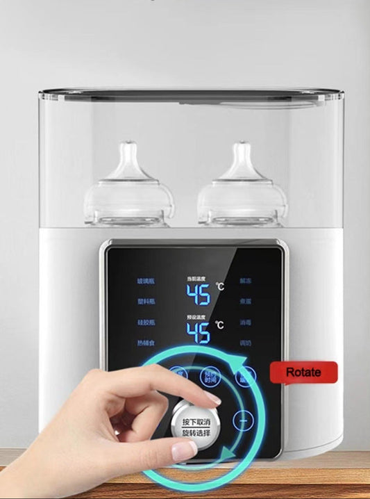 White smart baby bottle warmer with digital display and simple spin button.