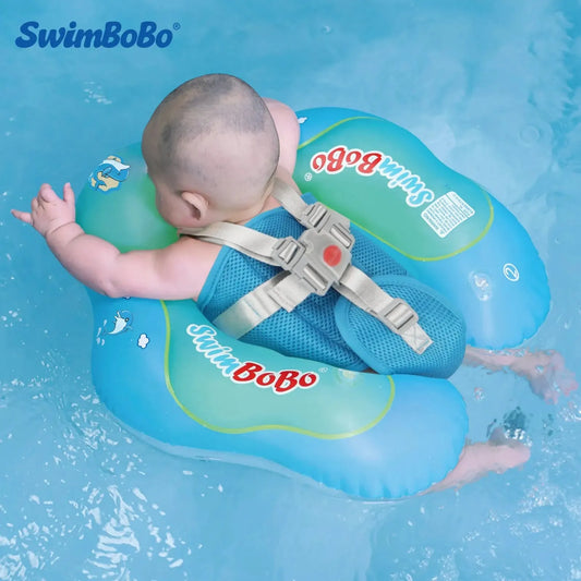 Baby in a blue SwimBobo inflatable swim float with safety harness, floating in a pool.