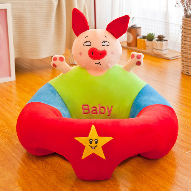 Plush pig baby support seat in red, blue, and green with a yellow star.