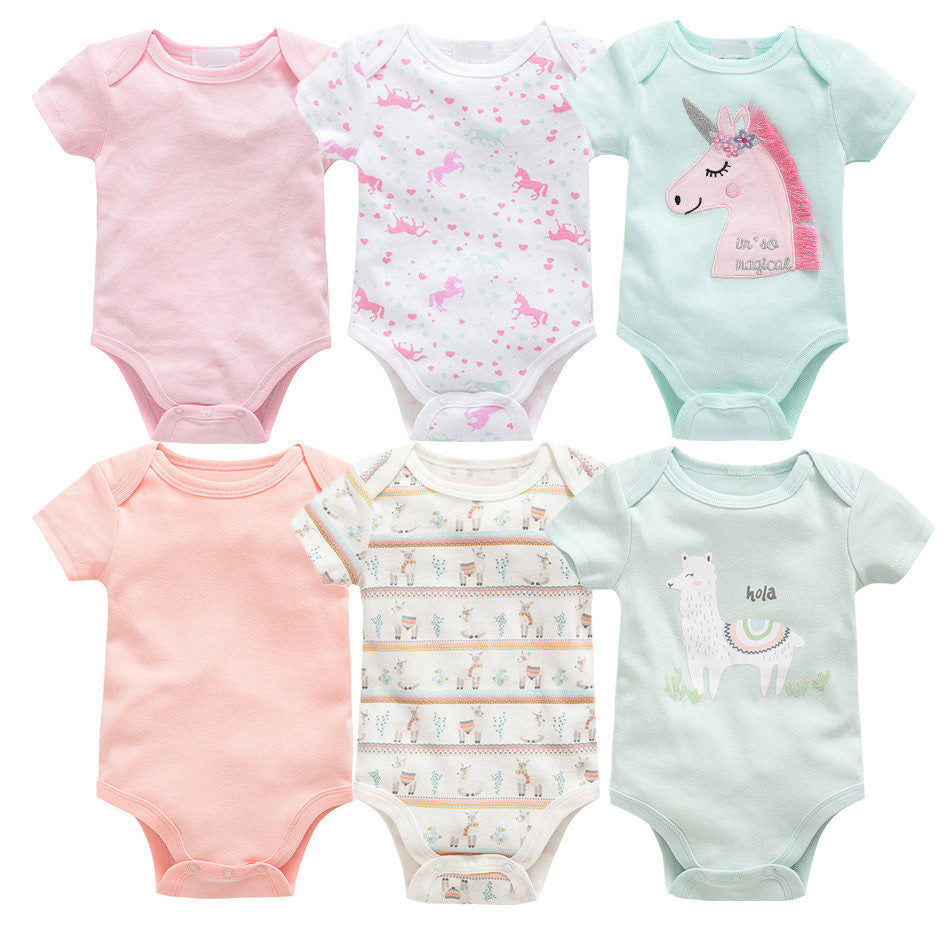 Six short-sleeve cotton baby bodysuits in pink, peach, mint, and white with unicorn and llama prints.