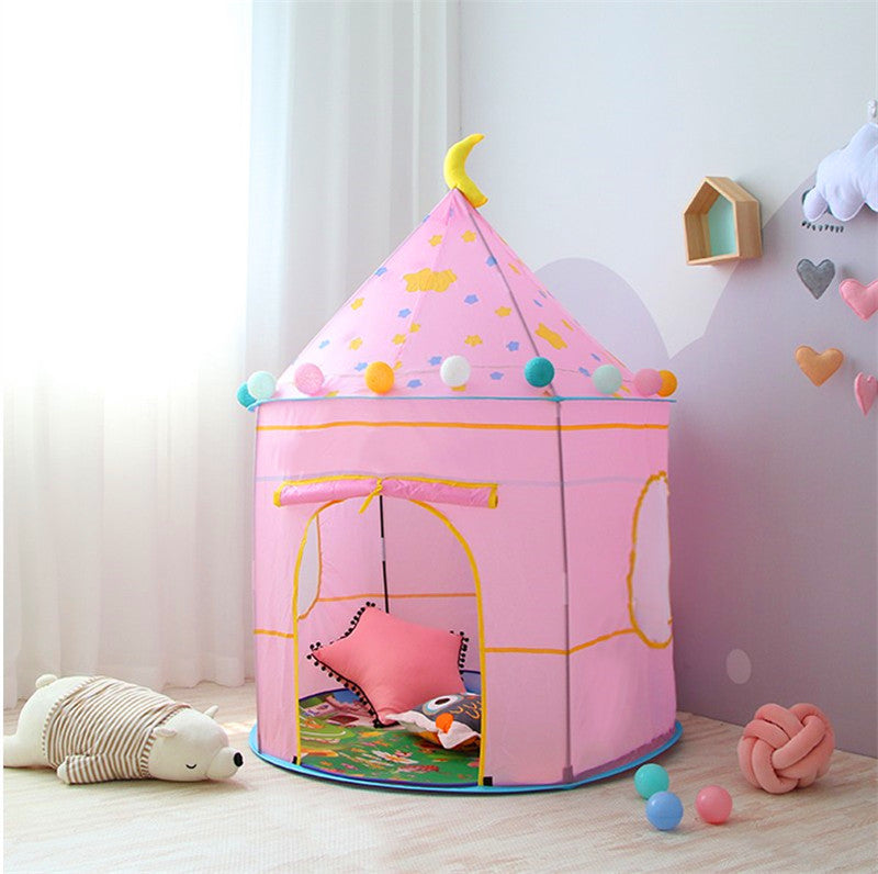 Pink children's play tent castle with stars, moon, and colorful pom-poms, suitable for indoor or outdoor use.