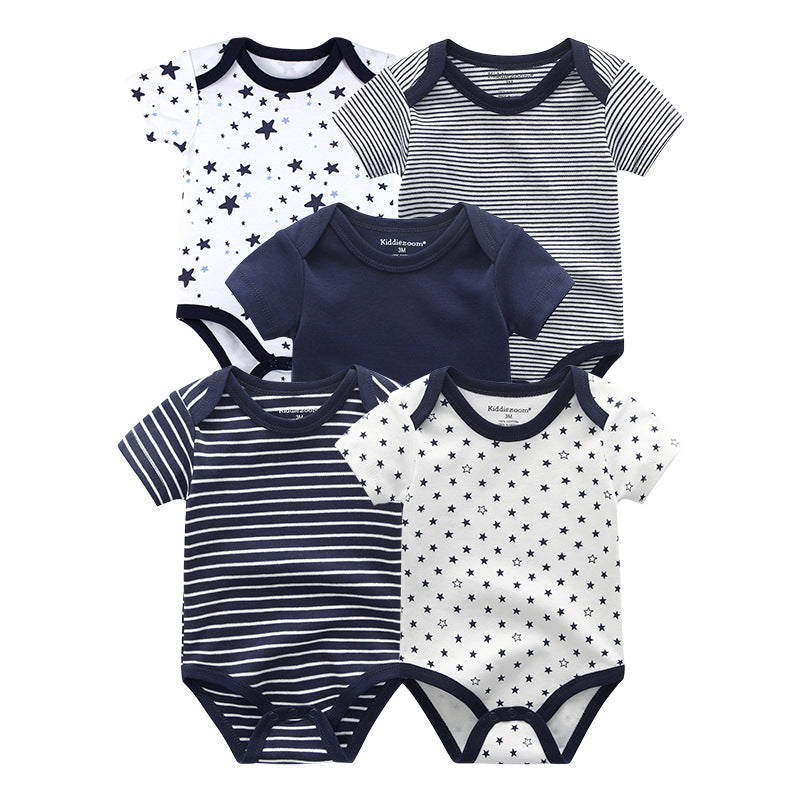 Five short-sleeve baby cotton bodysuits in navy, white, stripes, and star patterns.
