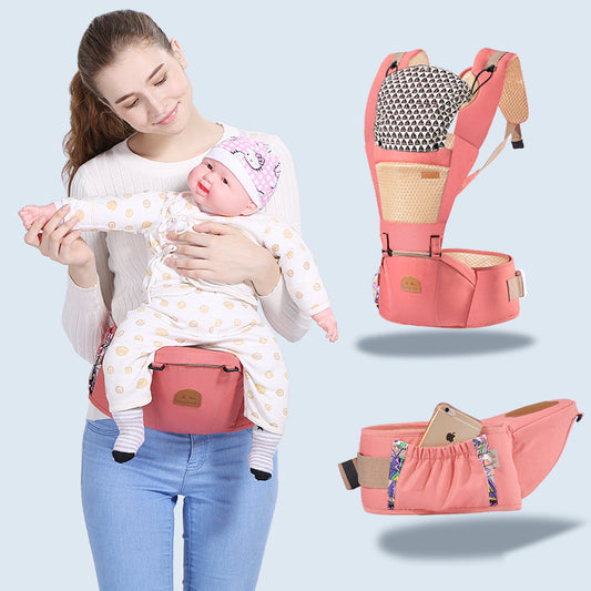 Pink ergonomic baby carrier with hip seat, breathable fabric, and storage pockets.