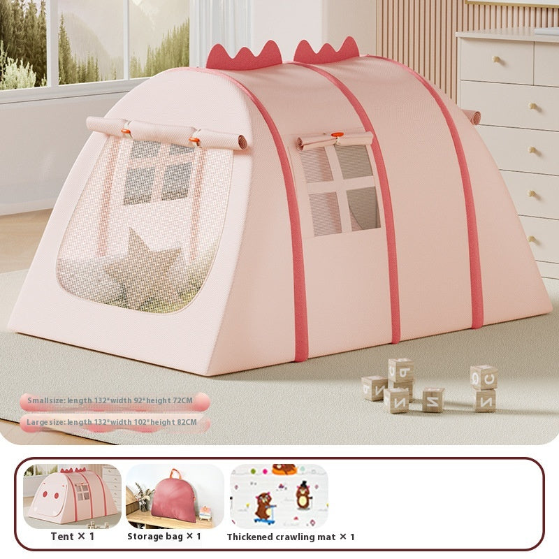 Pink fabric play tent for kids with mesh windows and dinosaur spikes, shown indoors.