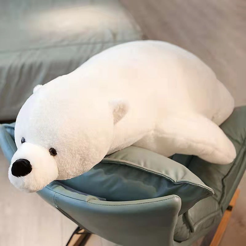 Large 110cm white plush polar bear stuffed animal lying on a blue chair.