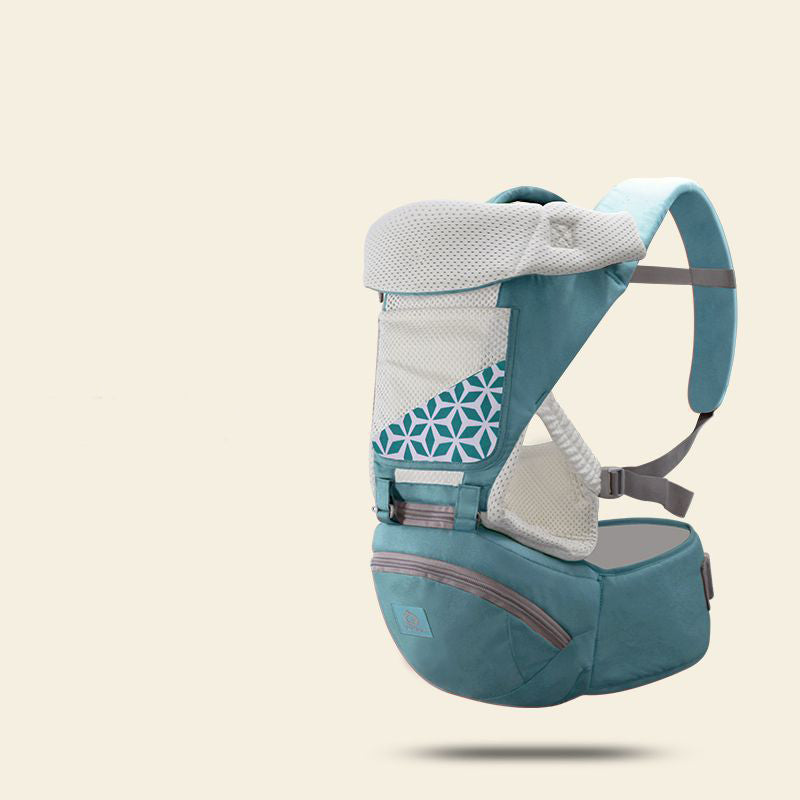 Ergonomic teal baby carrier with breathable mesh, hip seat, and geometric pattern.