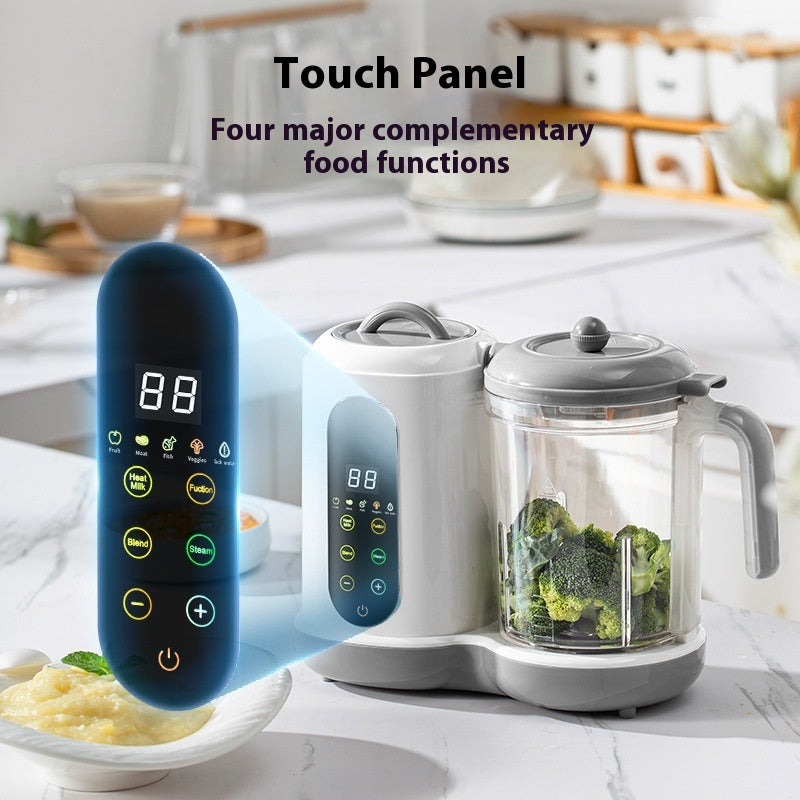 White and gray automatic baby food maker with a clear blending cup of broccoli and a detached touch control panel.