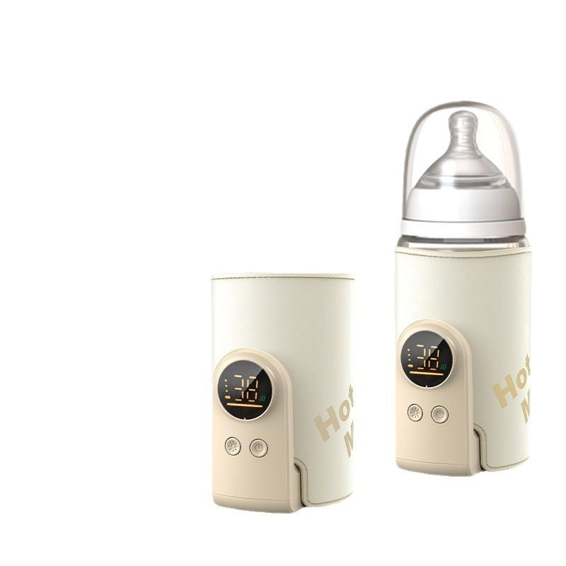 Portable rechargeable baby bottle warmer in cream with smart temperature control and digital display.