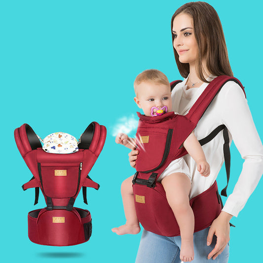 Woman carrying baby in a red ergonomic baby carrier with breathable waist seat; carrier shown separately.