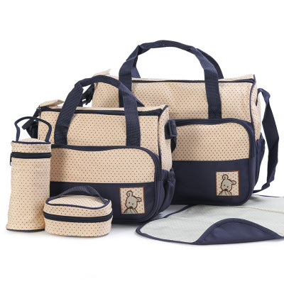 Beige and navy blue 5-piece diaper bag set with polka dots and sheep embroidery.
