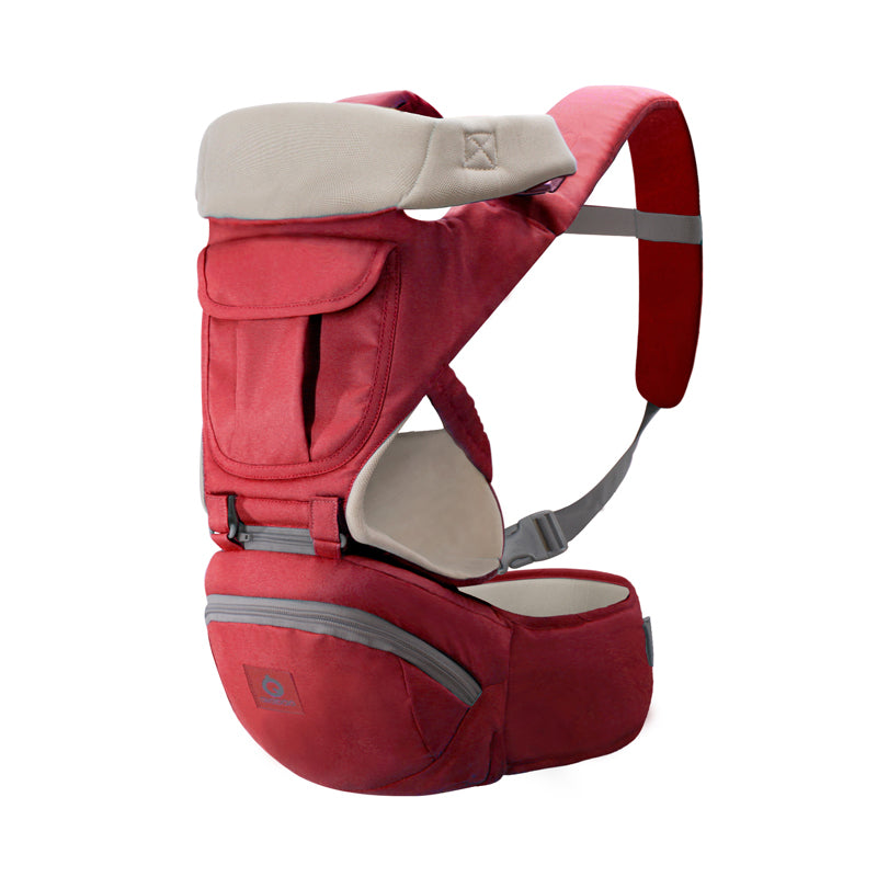 Red ergonomic baby carrier with breathable fabric, hip seat, and storage pockets.