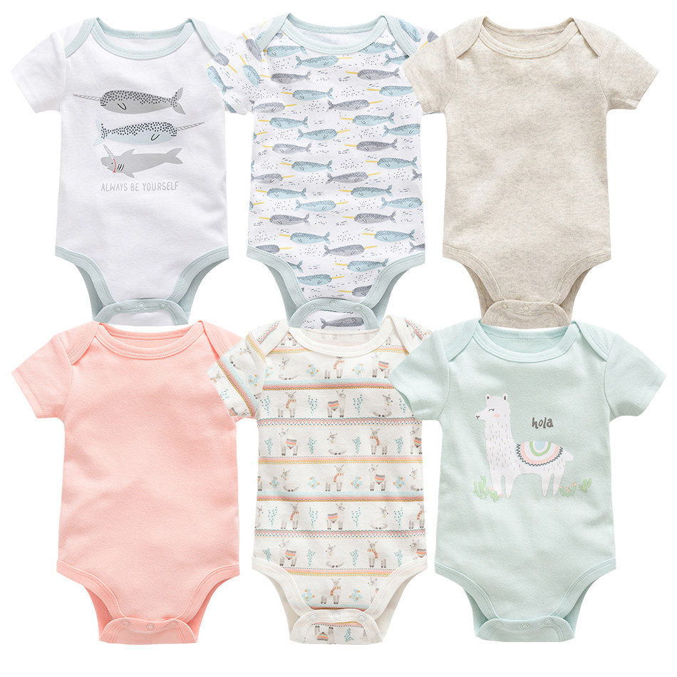 Six short-sleeve cotton baby bodysuits in white, pink, beige, light blue, and patterned designs.