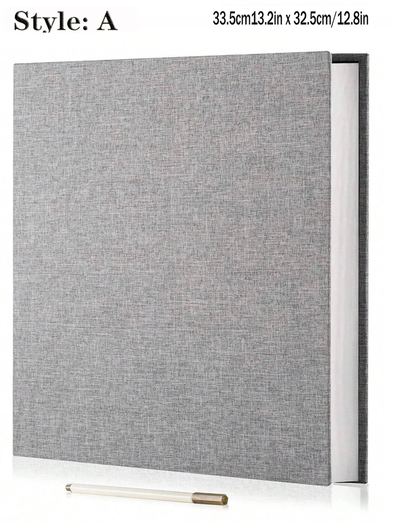Gray linen fabric photo album with a spiral binding, open to show white sticky pages, and a gold-tipped pen.