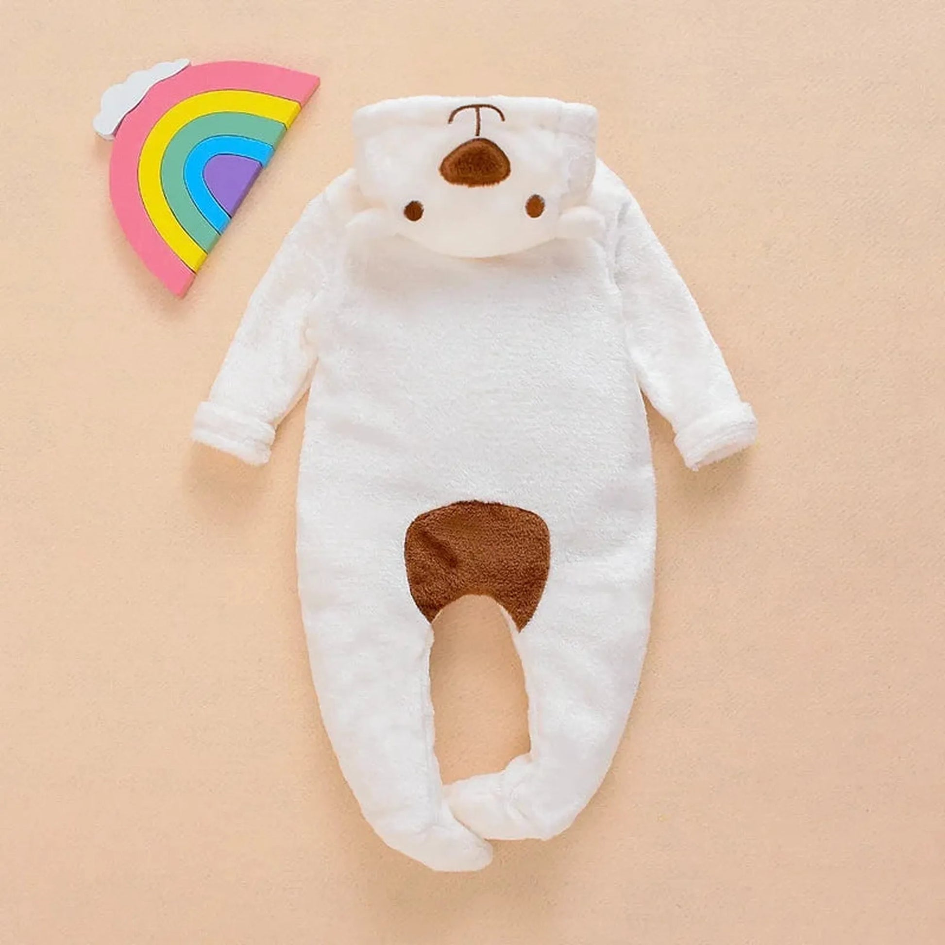 White plush baby bear hooded romper with brown nose and belly patch.