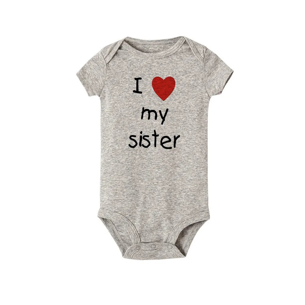 Unisex gray short-sleeve baby romper with "I love my sister" print and snap closures.