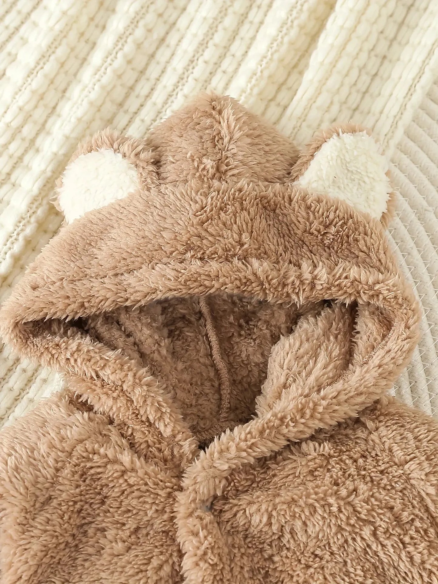 Brown fleece baby hooded romper with cute bear ears, perfect for autumn and winter warmth.