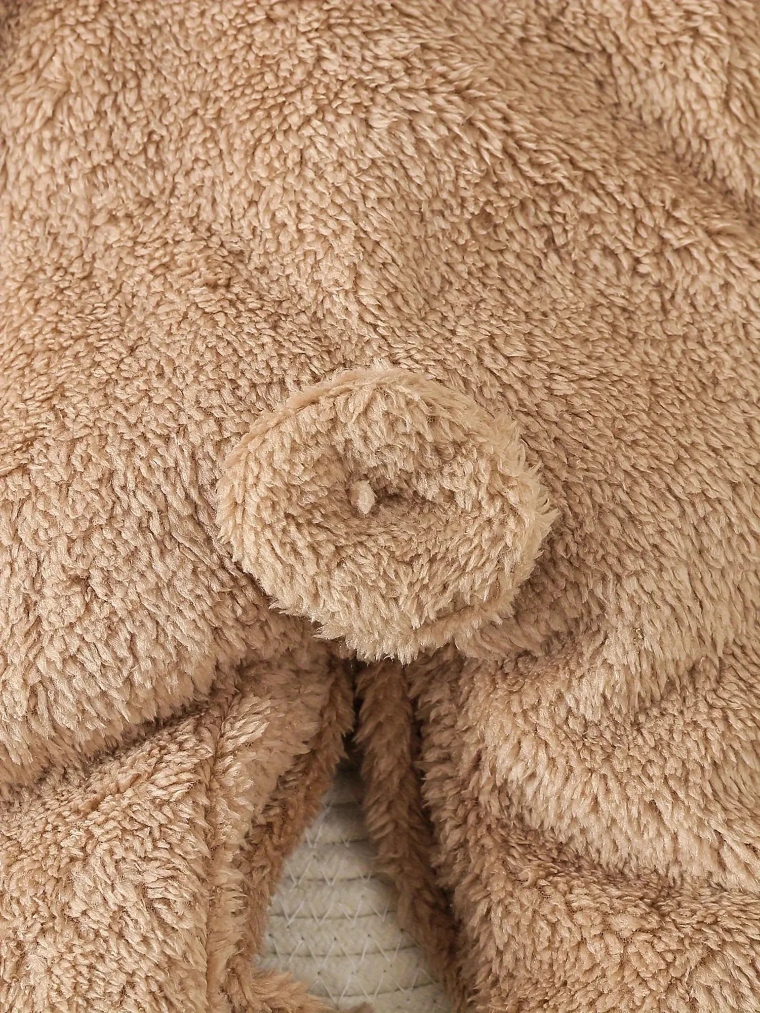 Soft brown fleece baby romper with a cute bear tail detail.