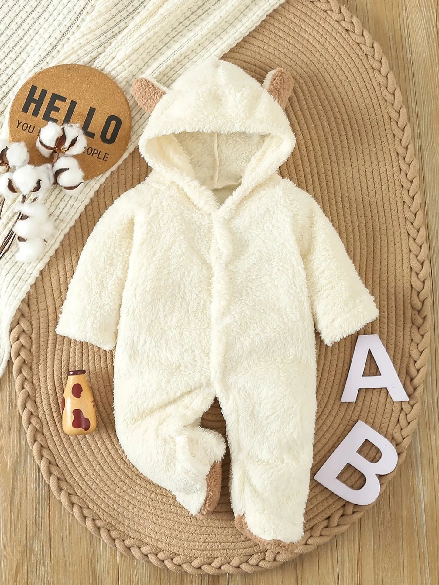 Cream fleece baby romper with bear ears hood, perfect for autumn and winter.