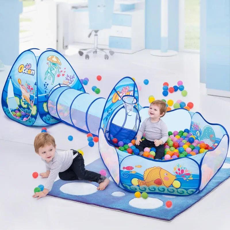 Blue 3-in-1 kids' play tent with tunnel and ball pit, featuring ocean graphics and two toddlers playing.