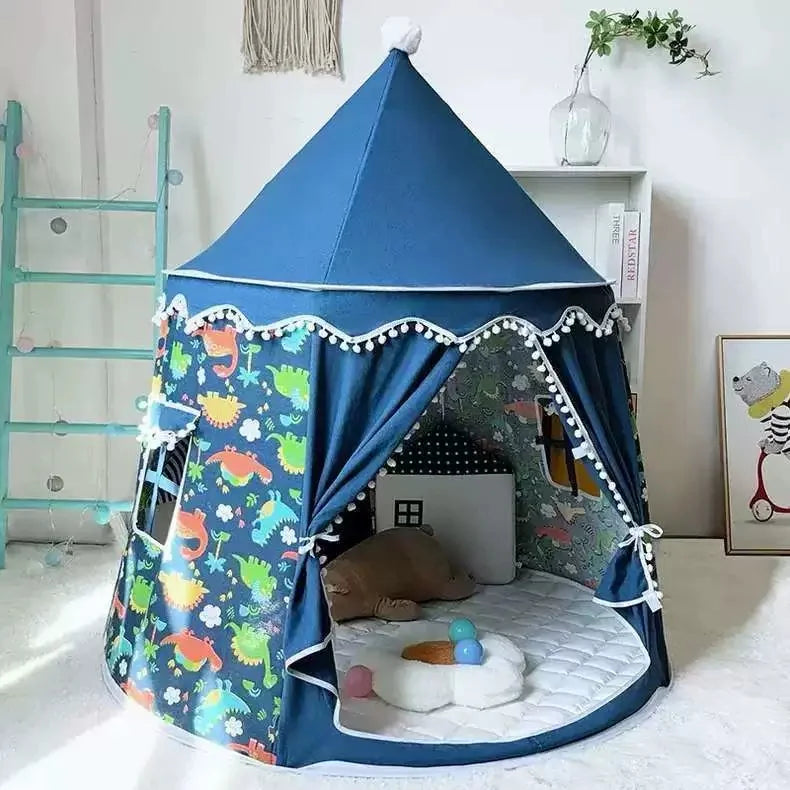Blue cotton foldable castle play tent for kids, featuring dinosaur print, pom-pom trim, and soft mat.
