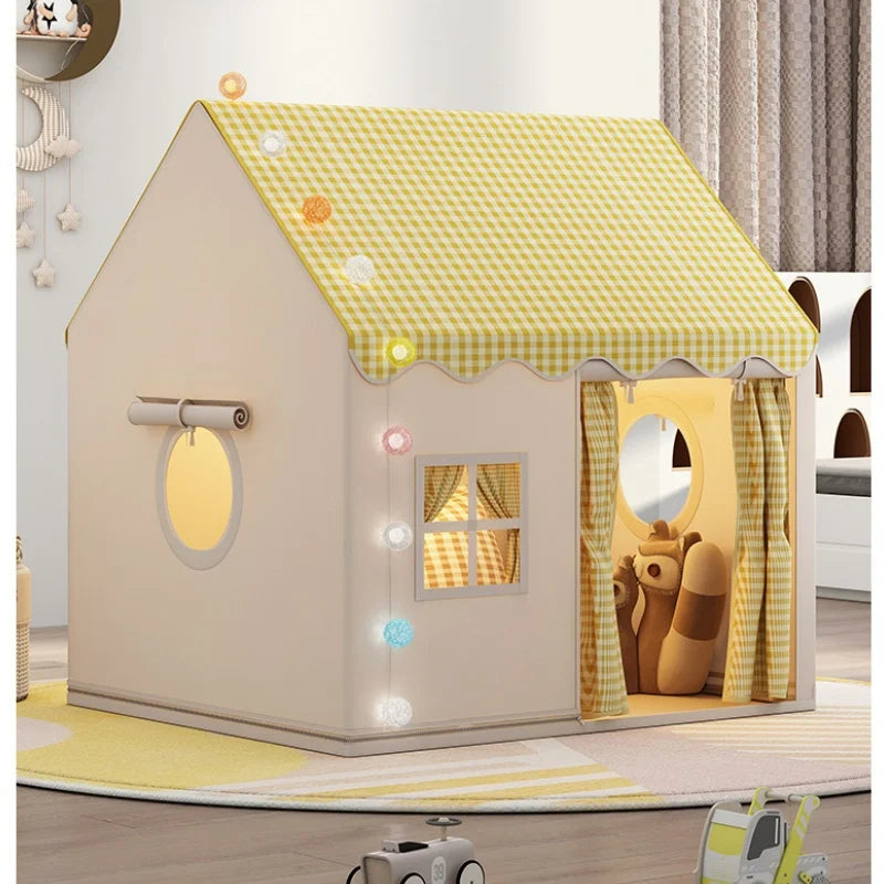 Foldable kids' play tent in beige with a yellow gingham roof, window, and door curtains.