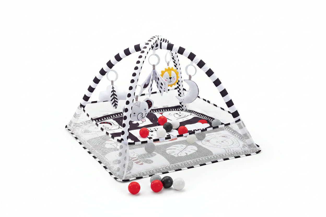 Black and white baby activity gym with soft arches, hanging rattles, and colorful play balls.