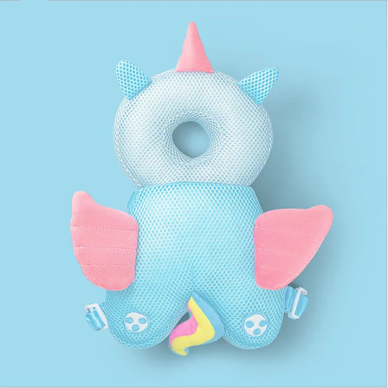 Blue mesh unicorn baby head protector with pink horn, ears, and wings, designed for fall protection.