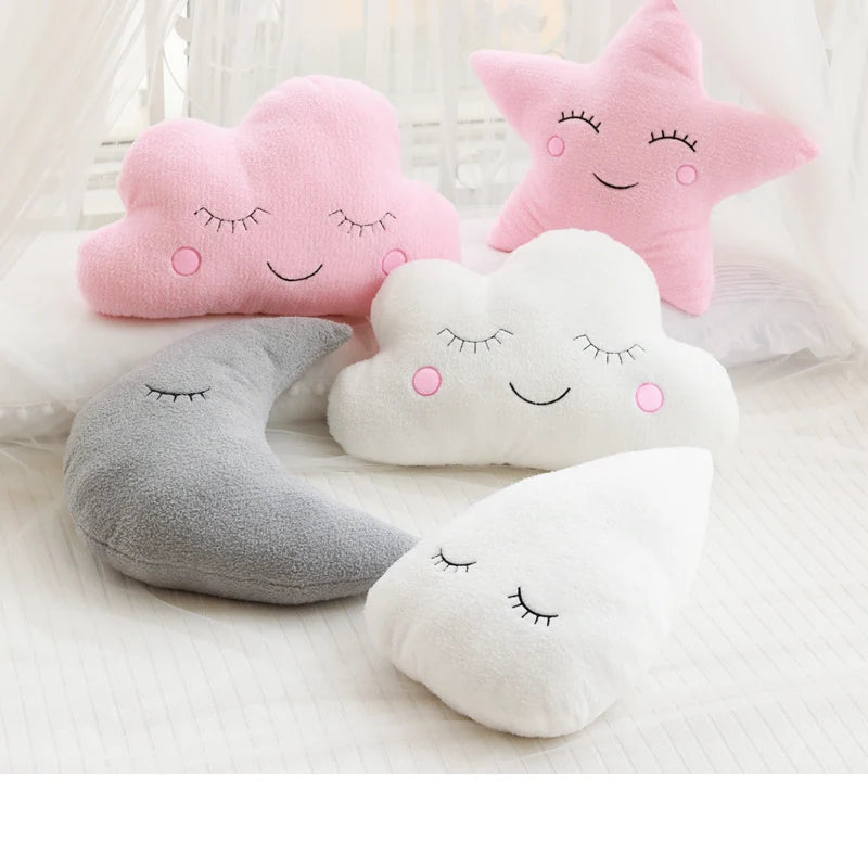 Soft plush baby decorative pillows: pink cloud, white cloud, pink star, gray moon, and white raindrop.