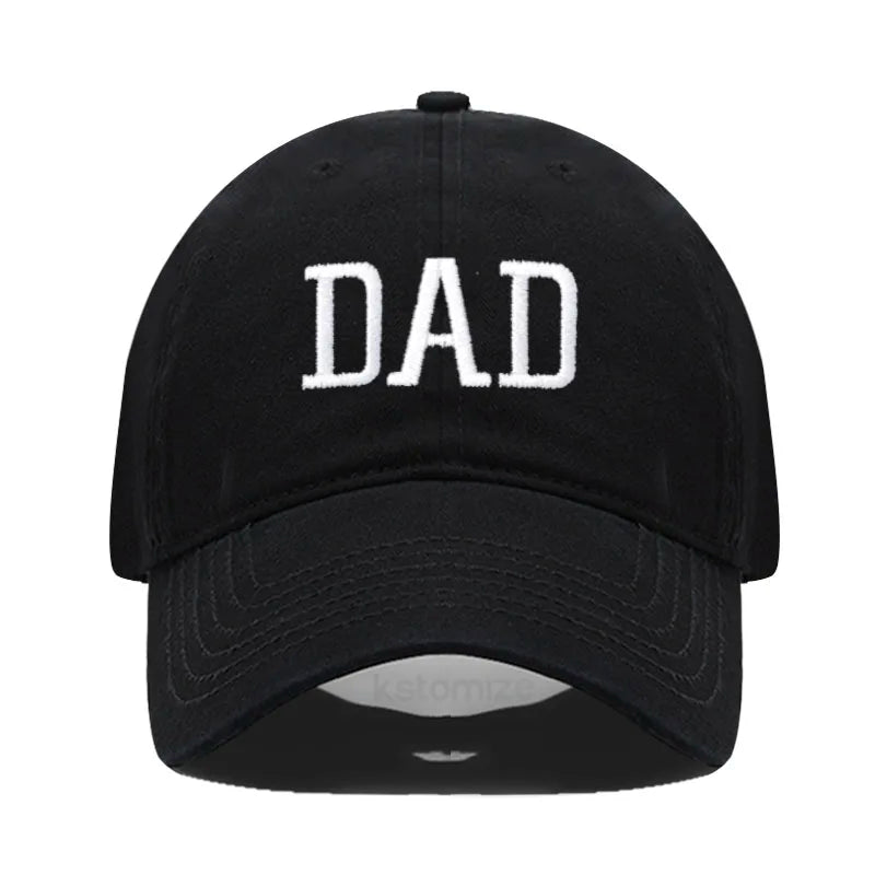 Black cotton baseball cap with "DAD" embroidered in white, adjustable for comfort.