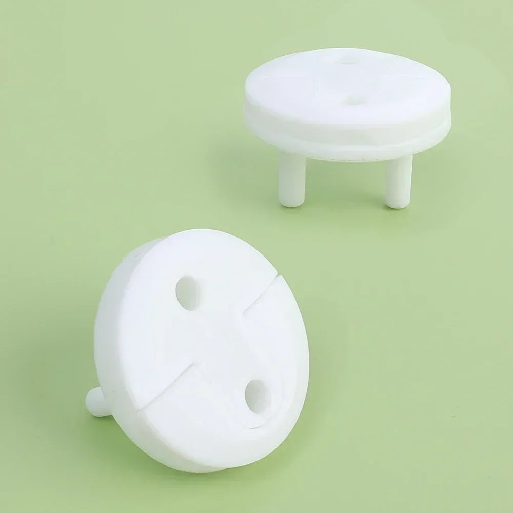 White child safety outlet covers for French standard sockets, made of durable ABS plastic with a pull handle.