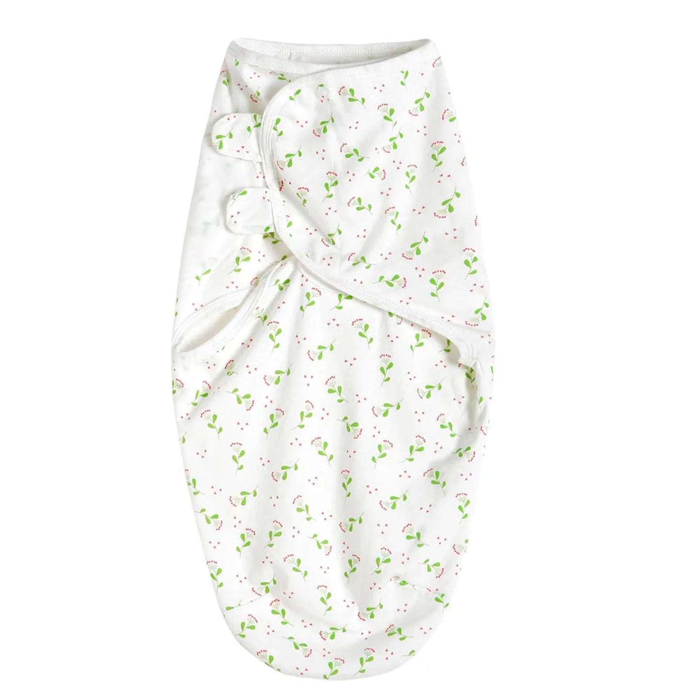 White cotton baby sleep sack with green leaf and red berry print, featuring a wrap-around design.