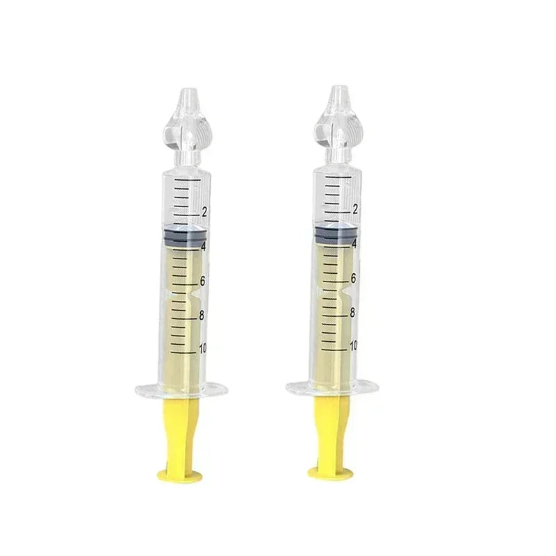 Two clear 10ml baby nasal aspirators with soft silicone tips and yellow plungers.