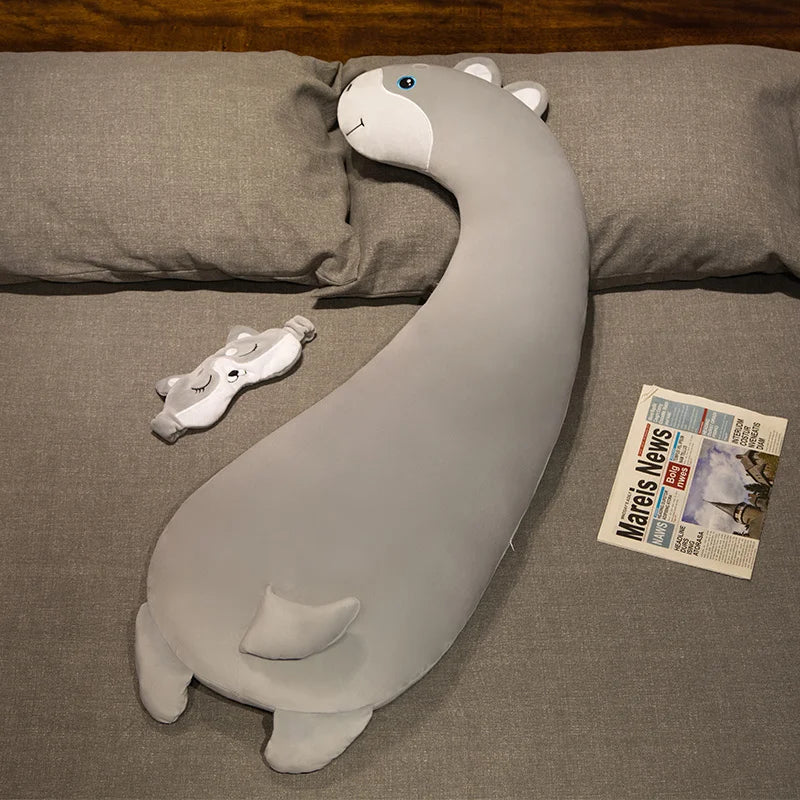 Soft gray plush husky pillow, 120cm, with a matching eye mask on a bed.