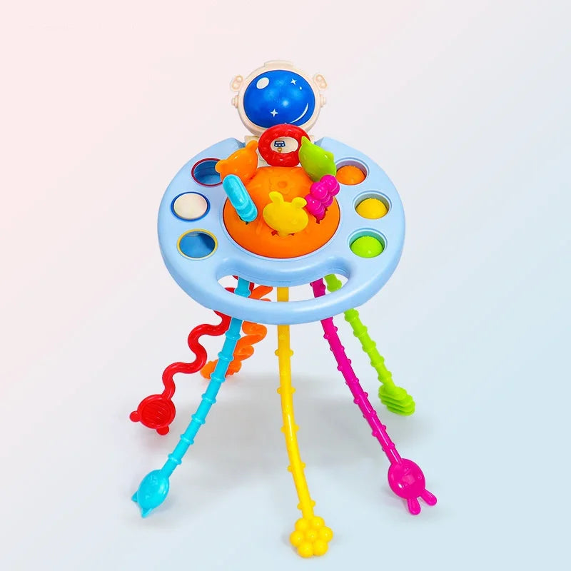 Colorful Montessori silicone sensory pull string toy with astronaut design.