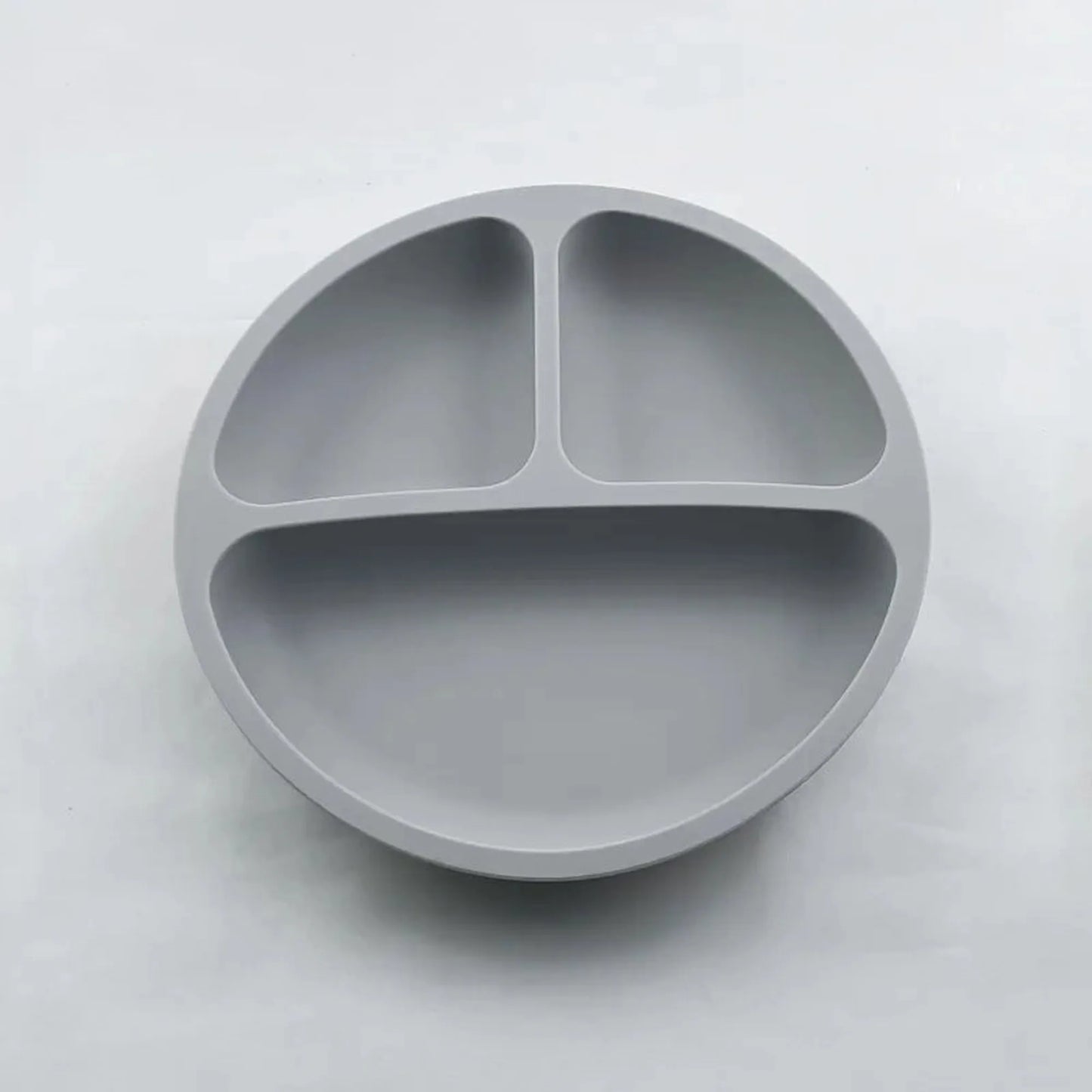 Gray silicone baby plate with three divided sections and a strong suction base.