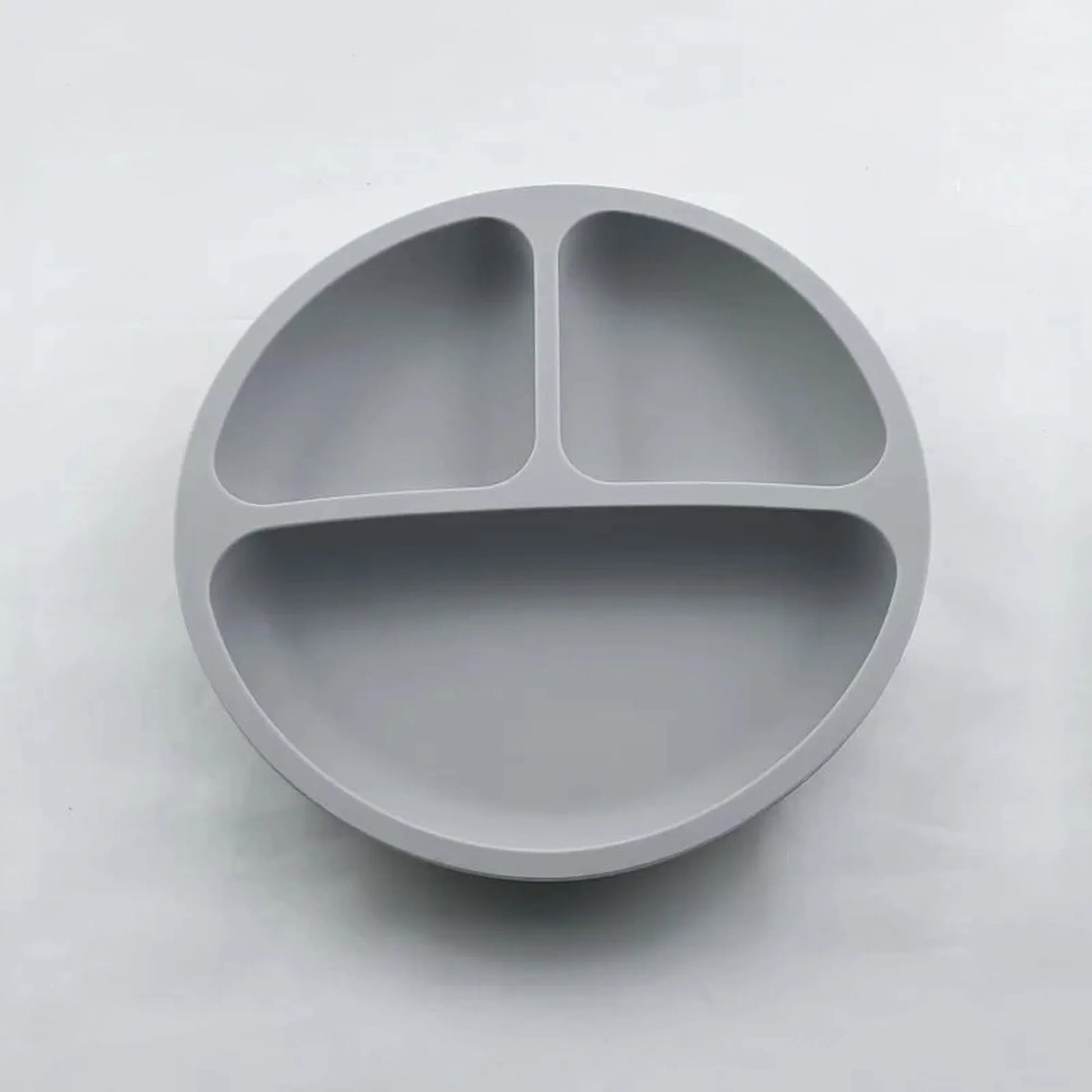 Gray silicone baby plate with three divided sections and a strong suction base.