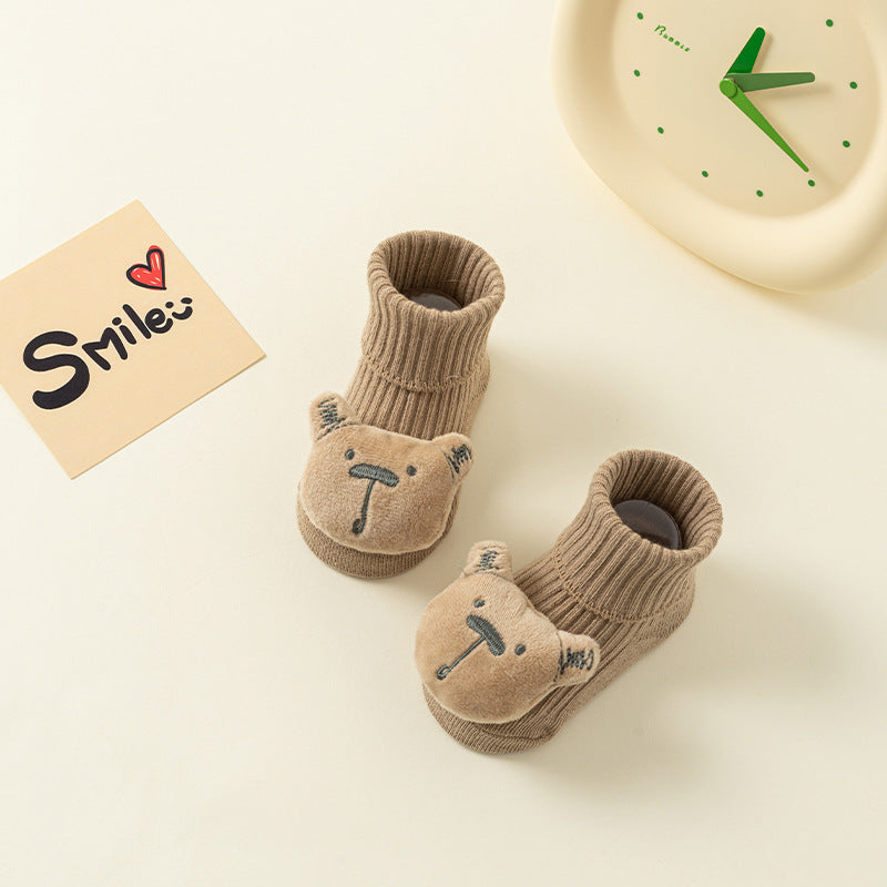Brown cotton baby socks with cute 3D bear faces and anti-slip soles.
