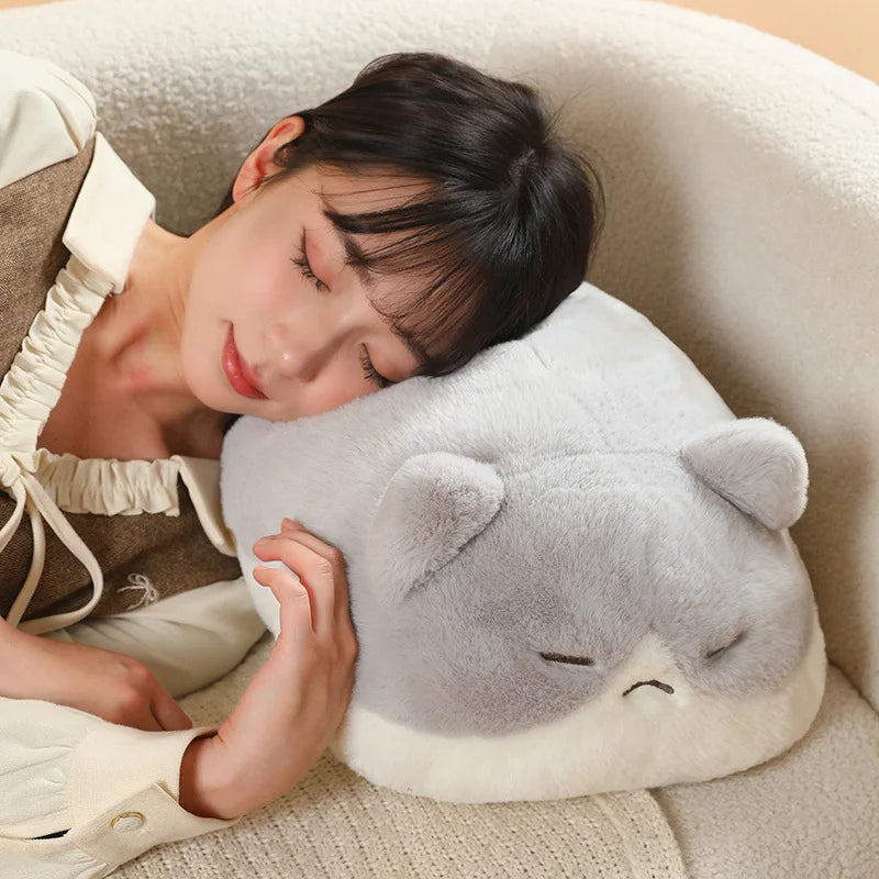 Woman sleeping peacefully with a soft, plush gray and white cat pillow, 45cm.