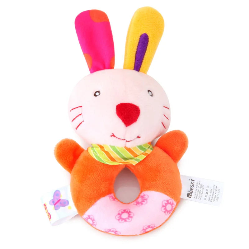 Soft plush orange bunny rattle teether with colorful ears and a striped scarf.