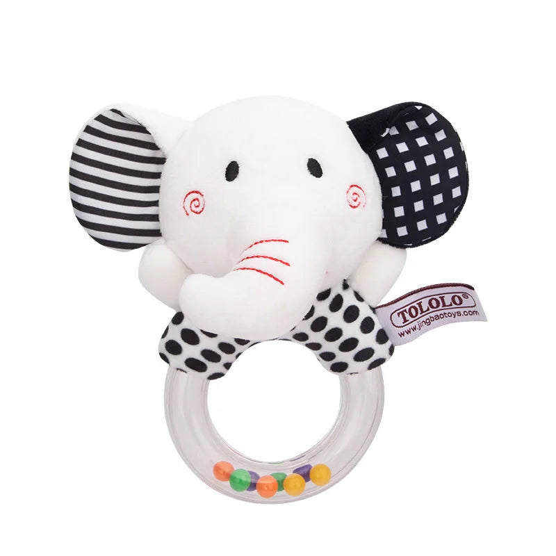 Soft white elephant plush baby teether rattle with black and white patterned ears and legs, clear ring.
