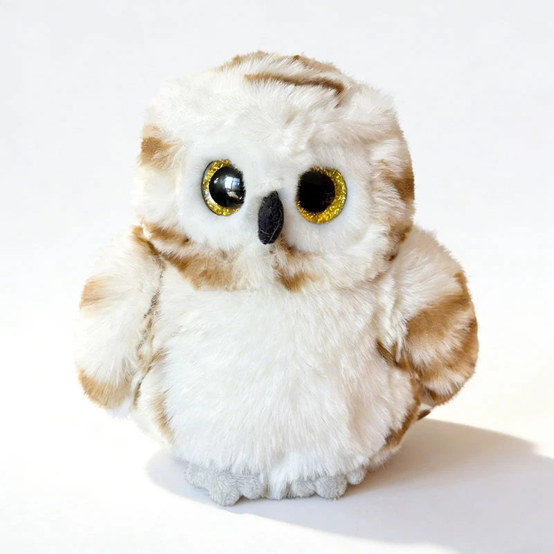 Fluffy white and brown magnetic owl plush toy with glittery gold eyes.