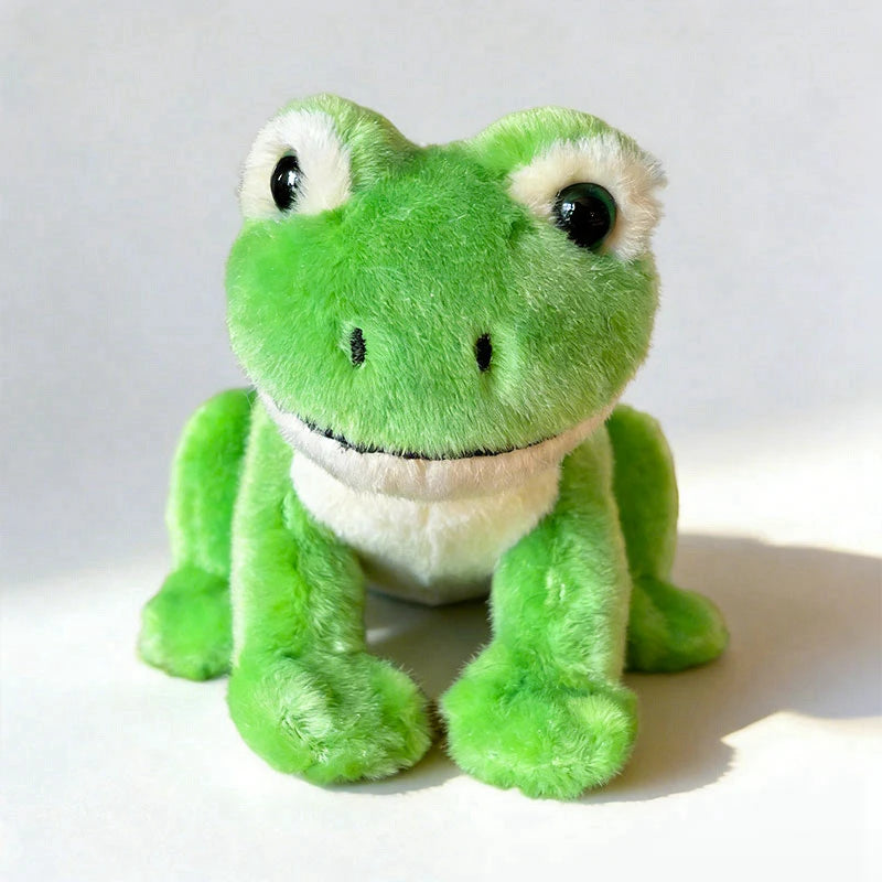Green plush magnetic frog shoulder toy with big eyes and white belly.