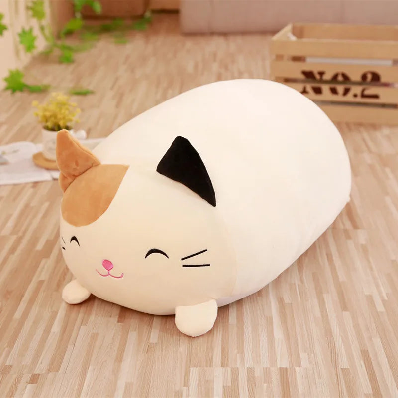 Soft white and brown plush cat toy with pink nose and black ears.