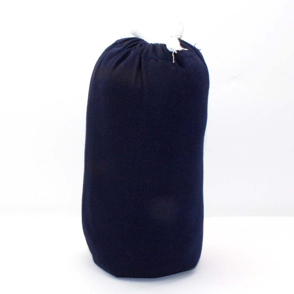 Dark blue soft cotton baby wrap carrier, folded and tied with white string, ready for travel.