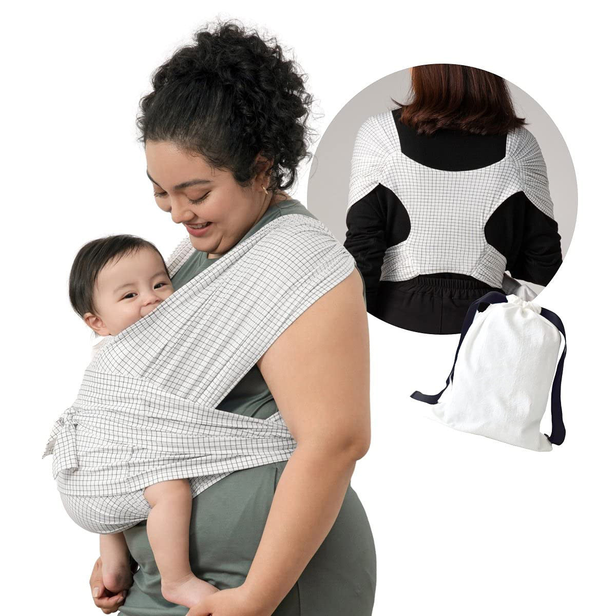 Woman carrying baby in a white plaid X-Type ergonomic mesh baby carrier with a storage bag.