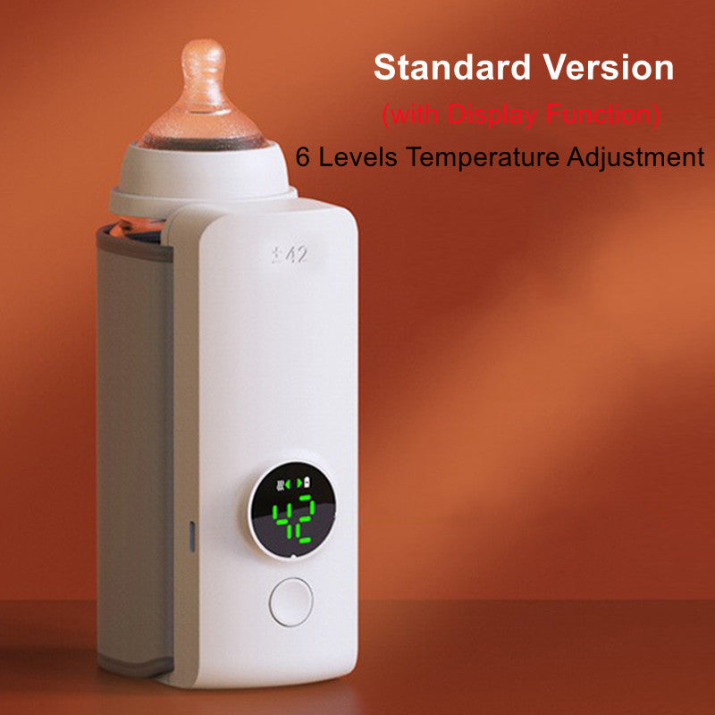 White portable USB rechargeable baby bottle warmer with smart temperature control display, attached to a baby bottle.
